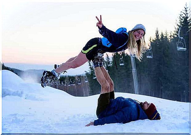 Couple playing in the snow