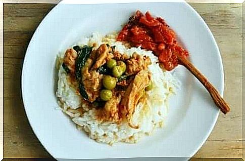 Chicken marinated in coconut milk with rice