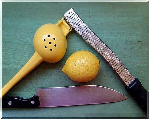 Lemon and kitchen utensils