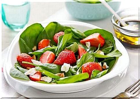 Fruit salad with herbs and strawberries