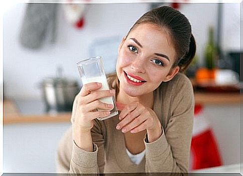 The woman is drinking rice water